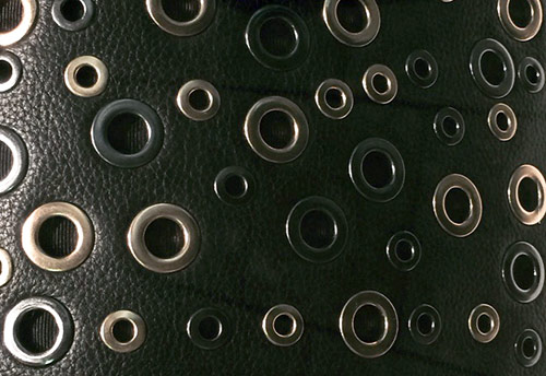 Eyelets on clothes, as a fashionable decor